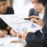 Photo credit (Businesspeople reviewing documents and graphs): www.istockphoto.com