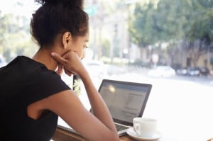 Photo credit (Businesswoman Using Laptop In Coffee Shop)L www.istockphoto.com