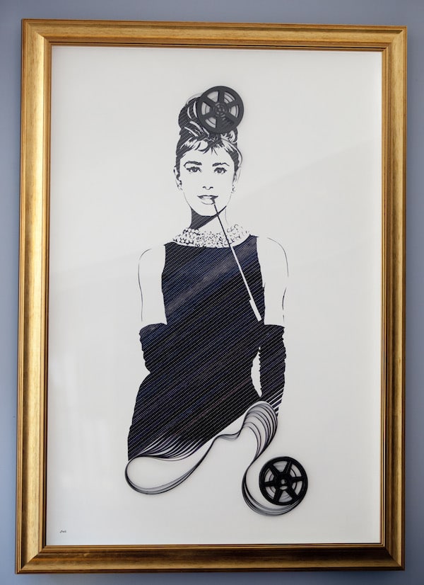 A portrait of Audrey Hepburn done with film strips is a signature feature of Dorsett Shepherd's Bush