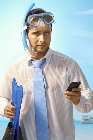 Urgent situations needing attention is main reason for travellers working on vacation. (Image credit: nyul/iStock)